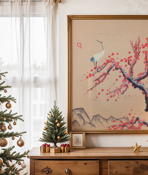 Elegant crane on cherry blossom tree with mountainous background