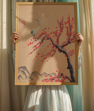 Elegant crane on cherry blossom tree with mountainous background