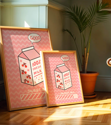 Playful illustration of milk carton with cherry design on pink background