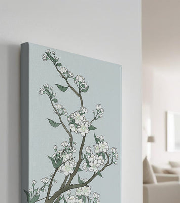 Delicate cherry blossoms on a soft blue background