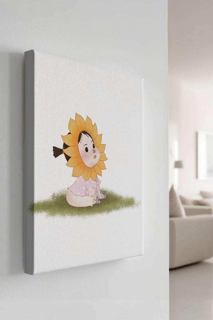 Adorable child with sunflower costume sitting on a grassy patch