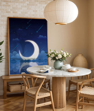 Serene night sky with crescent moon reflecting on water