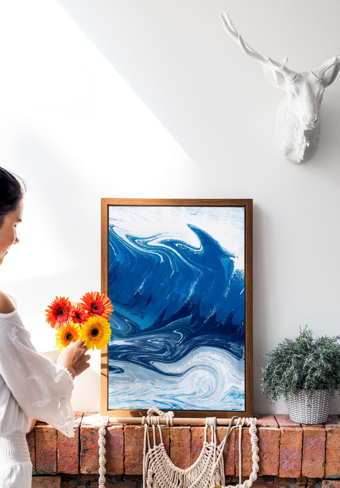Abstract blue and white ocean wave painting with swirling patterns