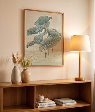 Elegant botanical illustration featuring large leaves with golden accents