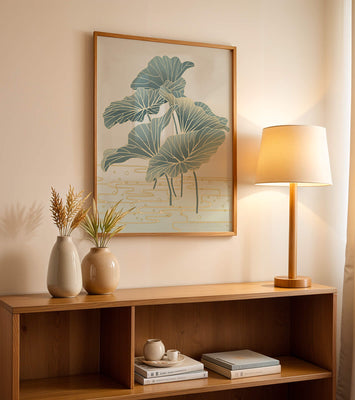 Elegant botanical illustration featuring large leaves with golden accents