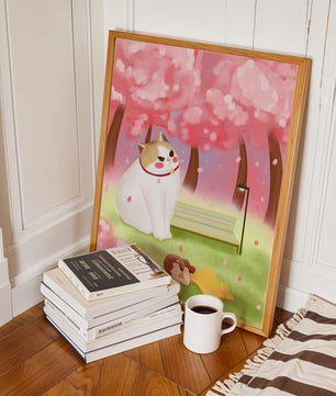 Whimsical scene with giant cat and girl under cherry blossoms
