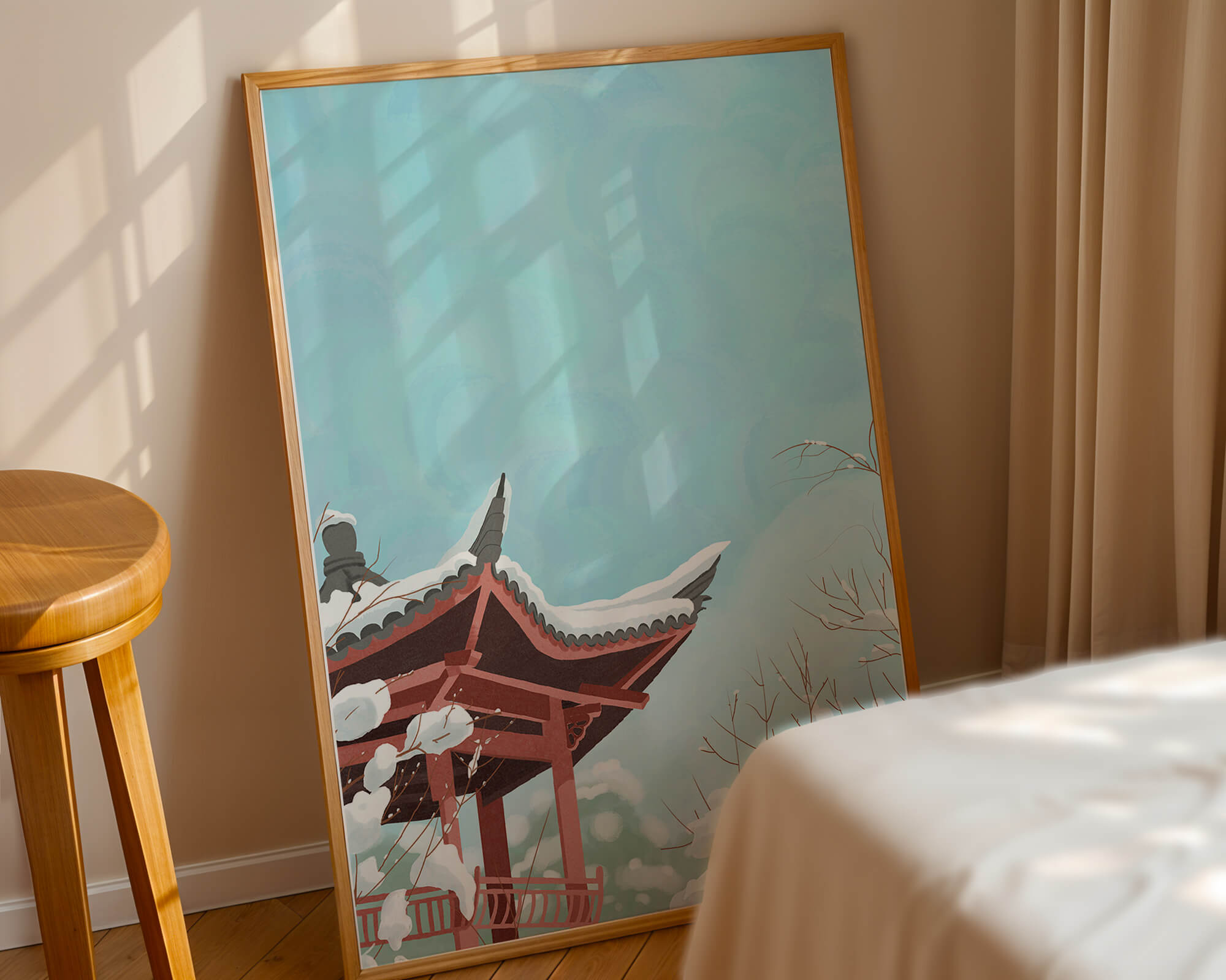 Snow-covered traditional pagoda under a clear blue sky