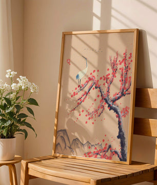 Elegant crane on cherry blossom tree with mountainous background