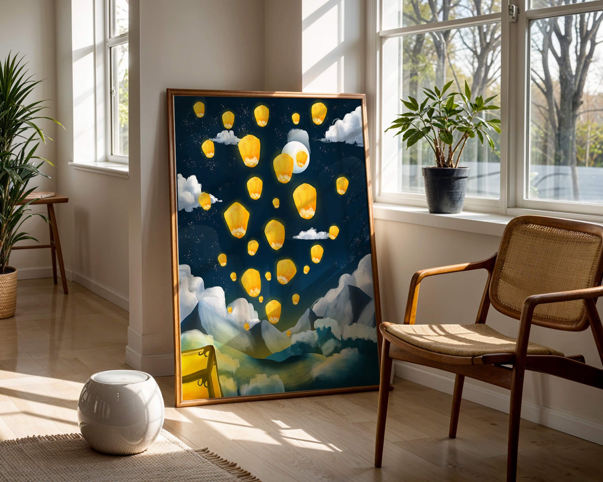 Lanterns floating in a starry night sky over mountains