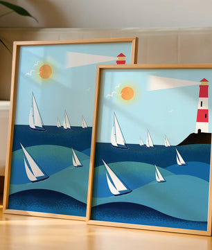 Coastal scene with sailboats and lighthouse on a bright sunny day