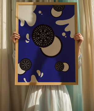 Graphic design featuring cookies and milk splashes on blue background