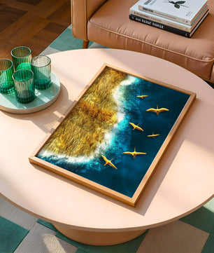 Golden beach landscape with vibrant ocean and flying seabirds