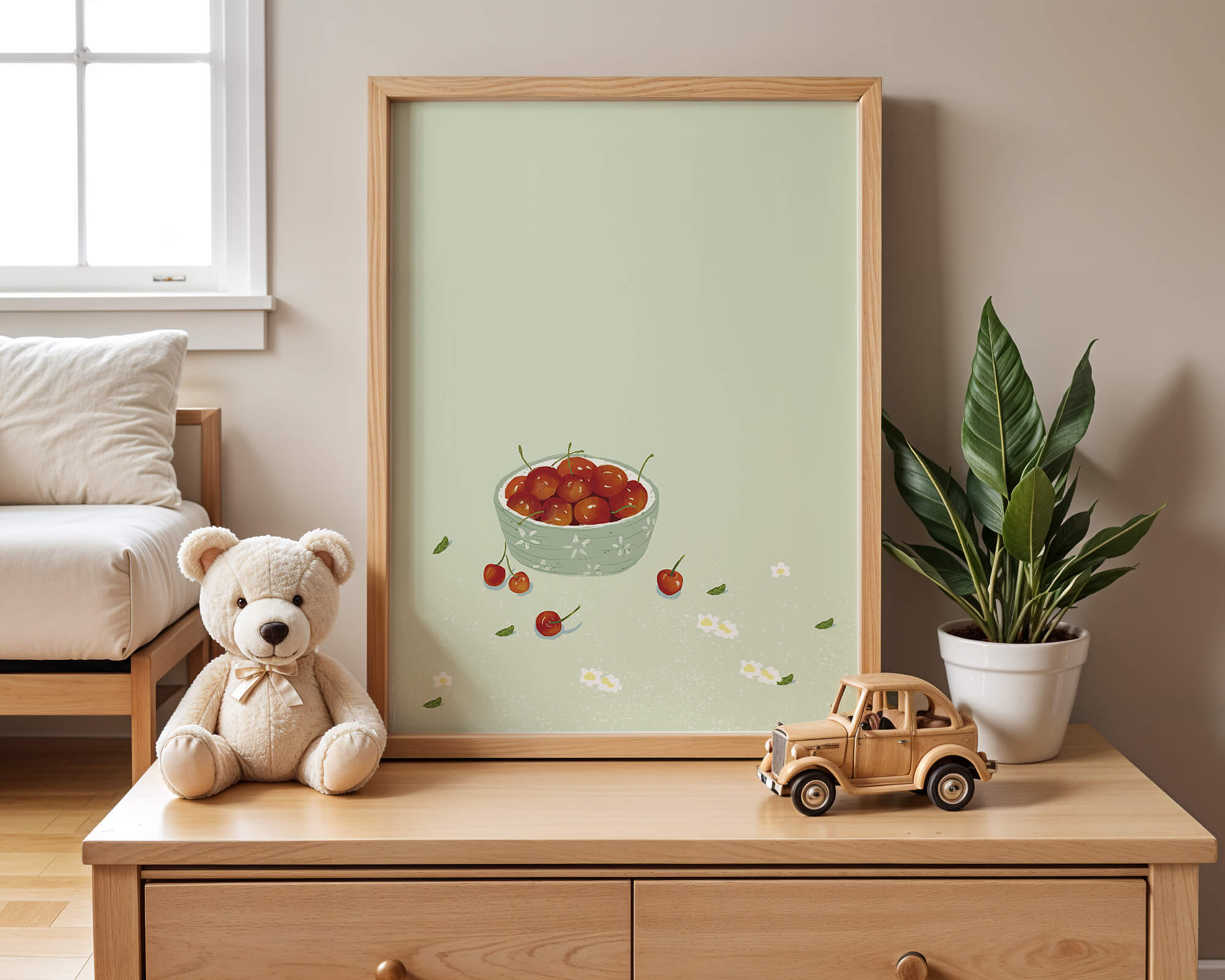 Cherries in a decorative bowl with floral accents on a soft green background