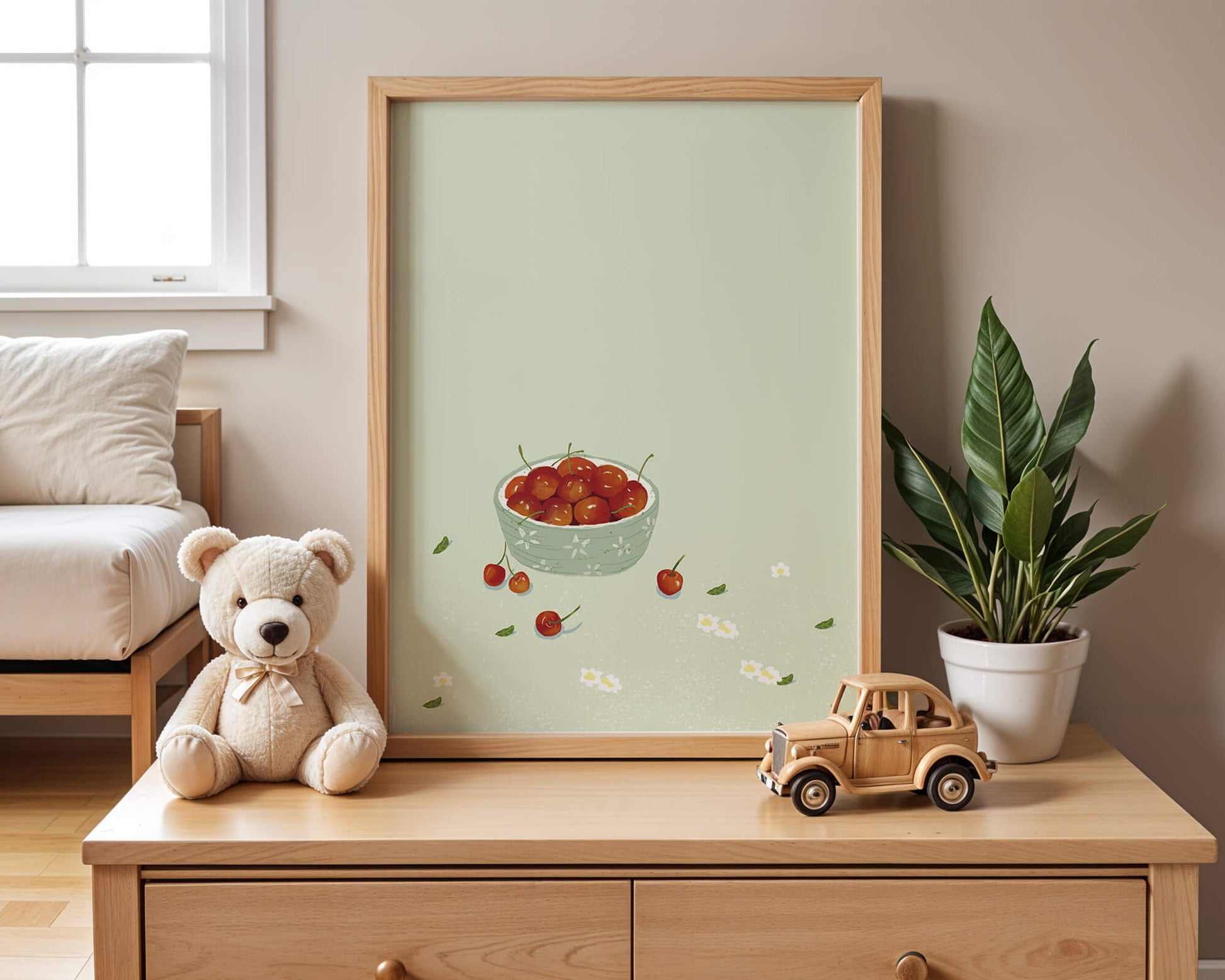 Cherries in a decorative bowl with floral accents on a soft green background