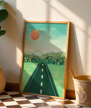 Serene Landscape with Road Leading to Sunset and Lush Greenery