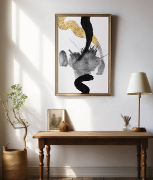 Abstract black and gold brushstrokes with textured patterns