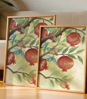 Watercolor illustration of pomegranates on a branch with leaves
