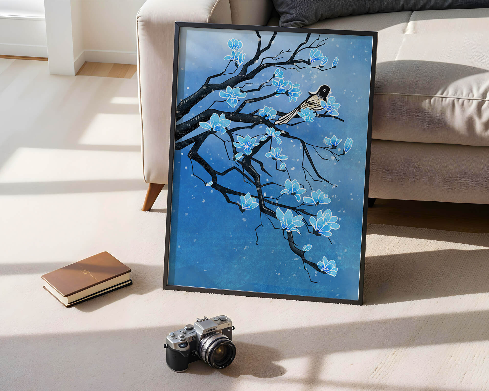 Bird on a branch with blue flowers against a snowy background