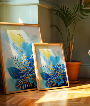 Floral illustration with blue leaves and golden accents on abstract background
