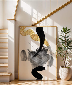 Abstract black and gold brushstrokes with textured patterns