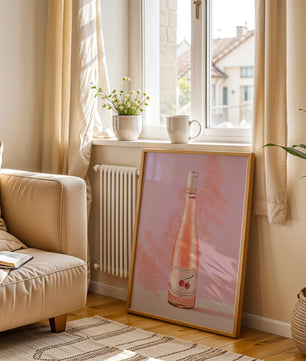 Illustrated wine bottle with a cherry label on pink background
