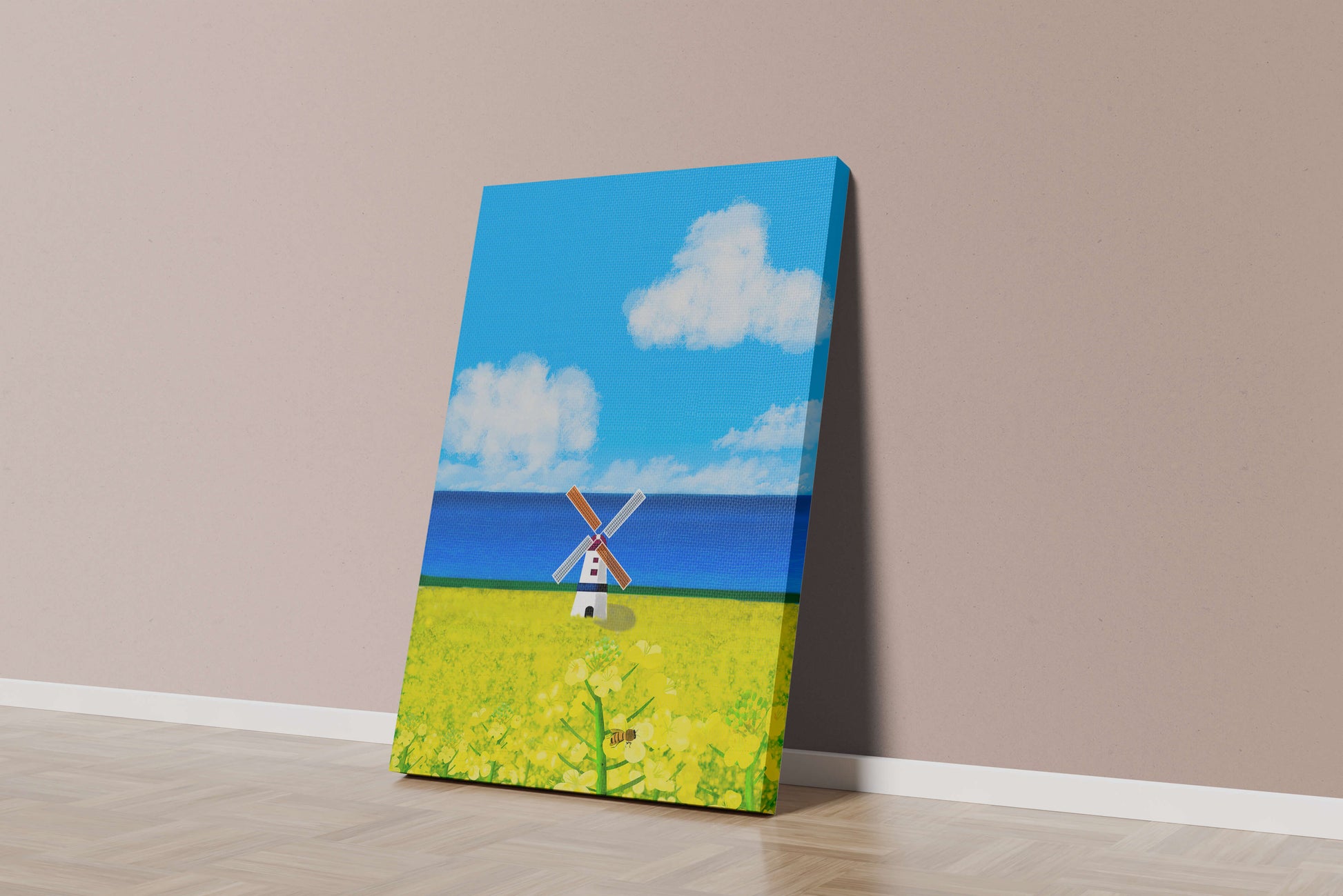 Scenic landscape with windmill in blooming field by the sea