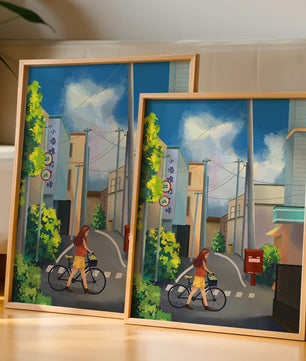 Young woman with bicycle in a quiet urban street