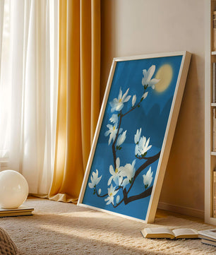 White magnolia branch under moonlight with blue background