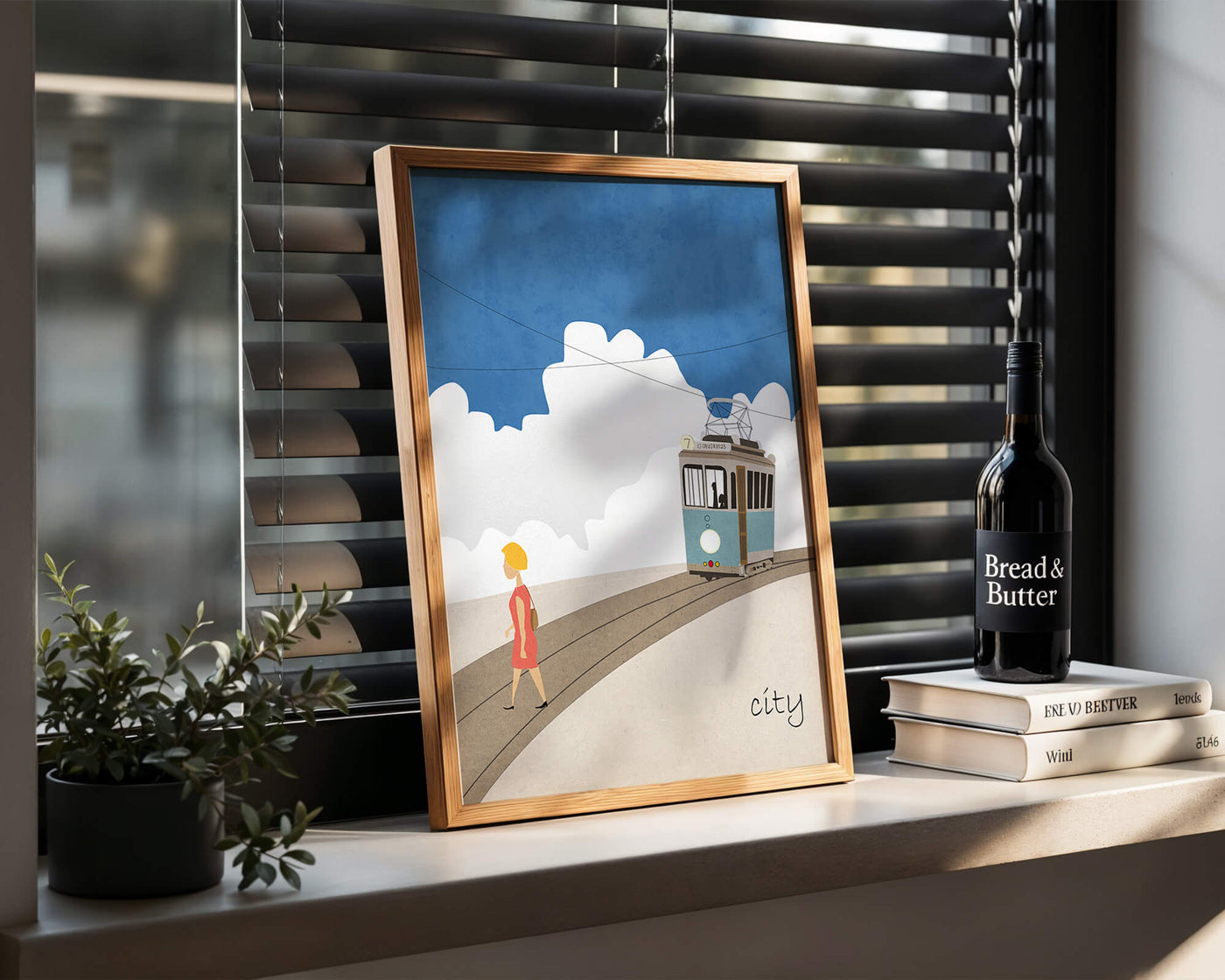 Urban scene with tram and pedestrian under a blue sky