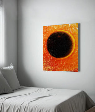 Abstract Representation of a Solar Eclipse with Vibrant Orange and Black Contrast