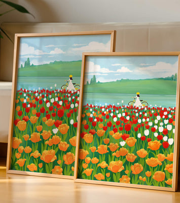 Woman with bicycle in vibrant tulip field by a lake