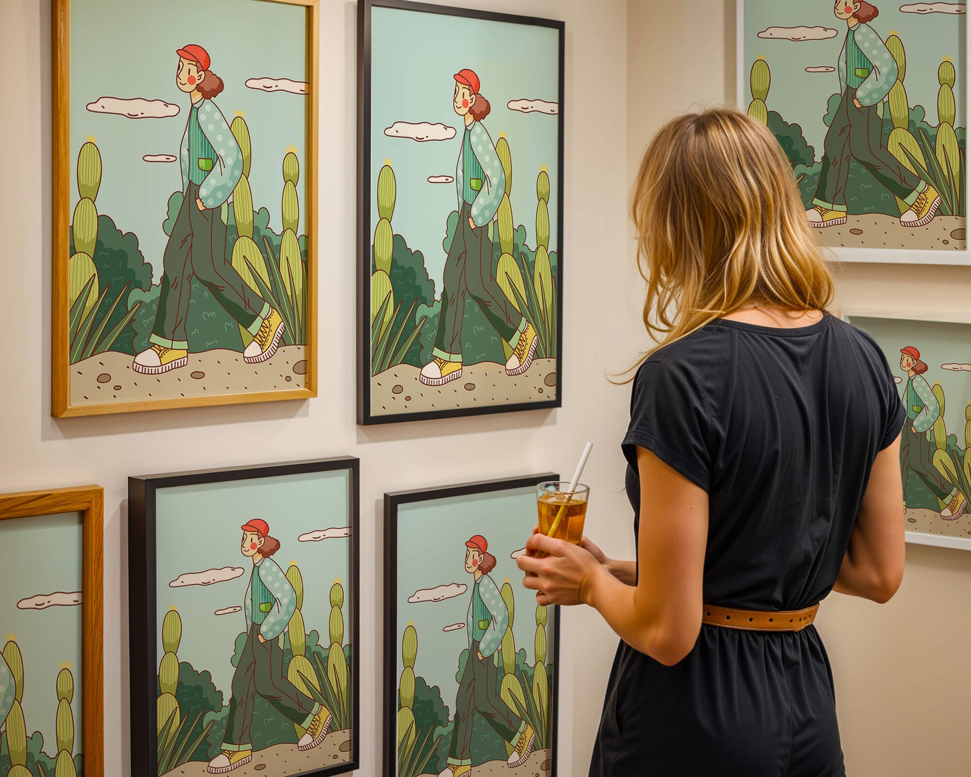 Person walking in desert landscape with cacti