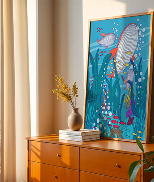 Underwater world illustration with whales and fish amidst seaweed