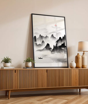 Peaceful mountain landscape with mist and rising sun