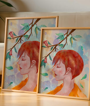 Illustrative artwork of a woman with red hair and floral branch