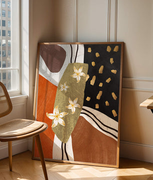 Abstract floral artwork with gold accents and earthy tones