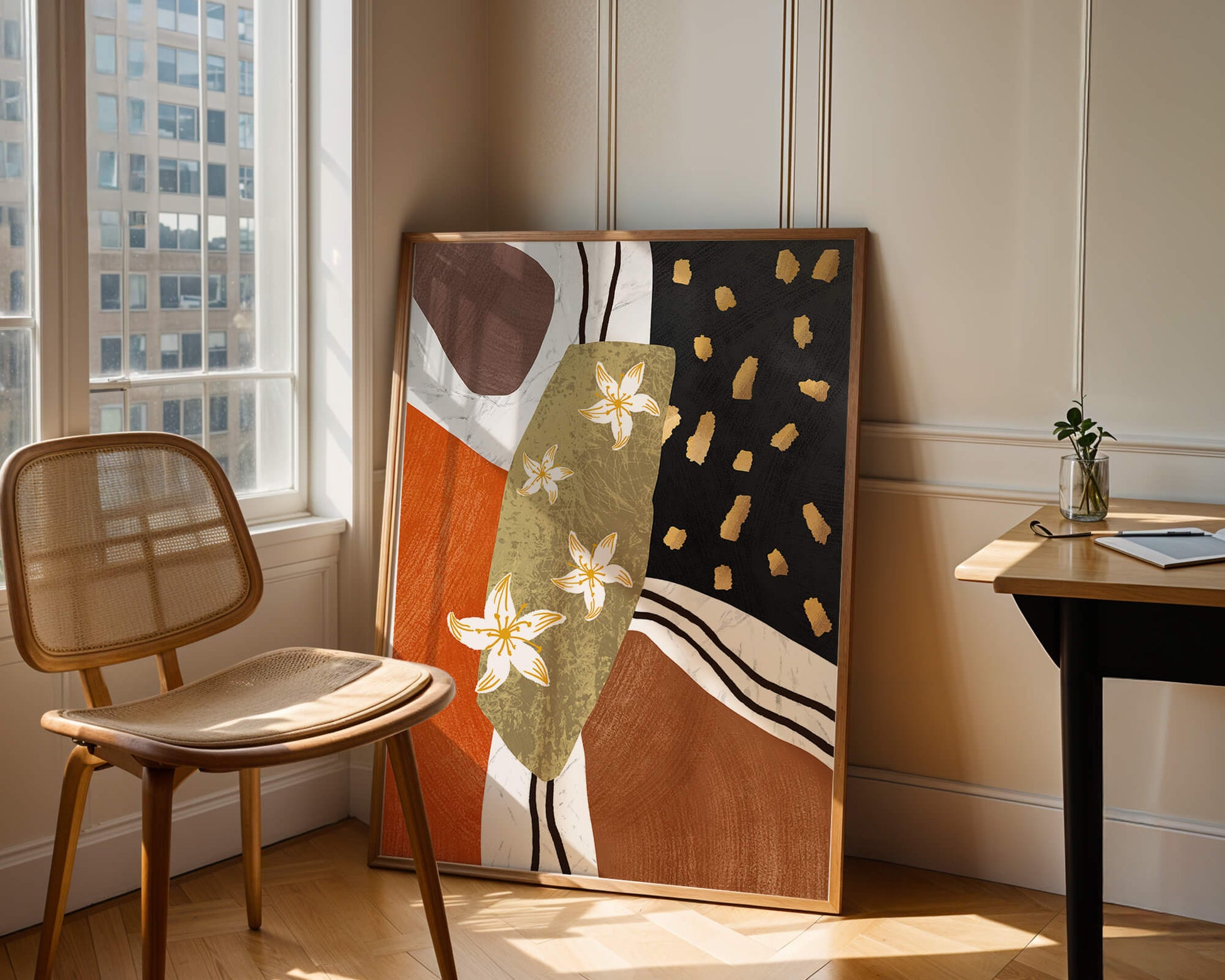 Abstract floral artwork with gold accents and earthy tones