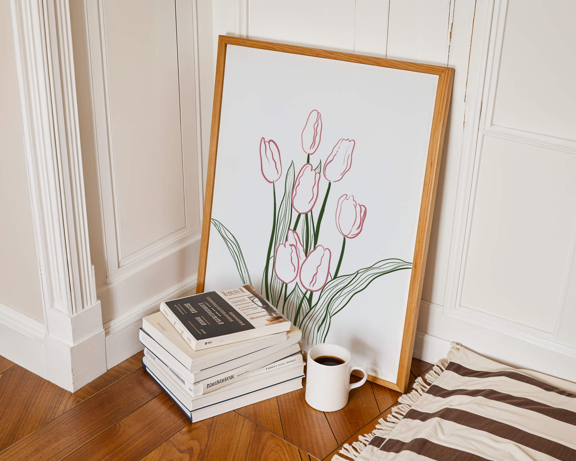 Wunderschöne rosa Tulpen mit grünen Blättern auf einer minimalistischen Leinwand