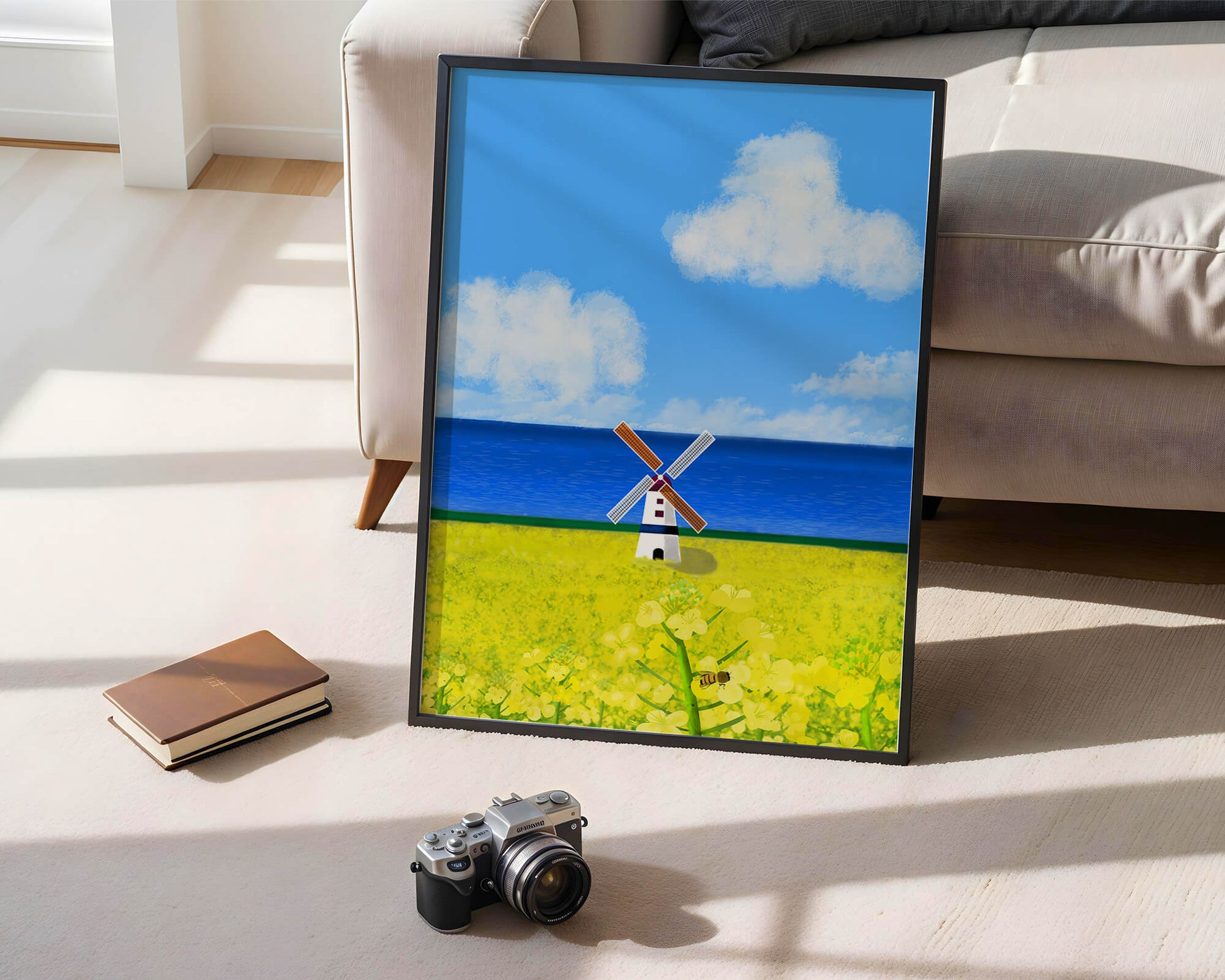 Scenic landscape with windmill in blooming field by the sea