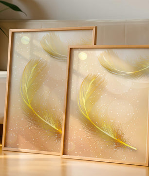 Elegant golden feathers with sparkling particles on soft background