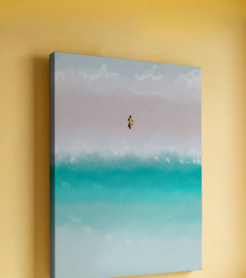 Serene beach with turquoise waves and solitary figure