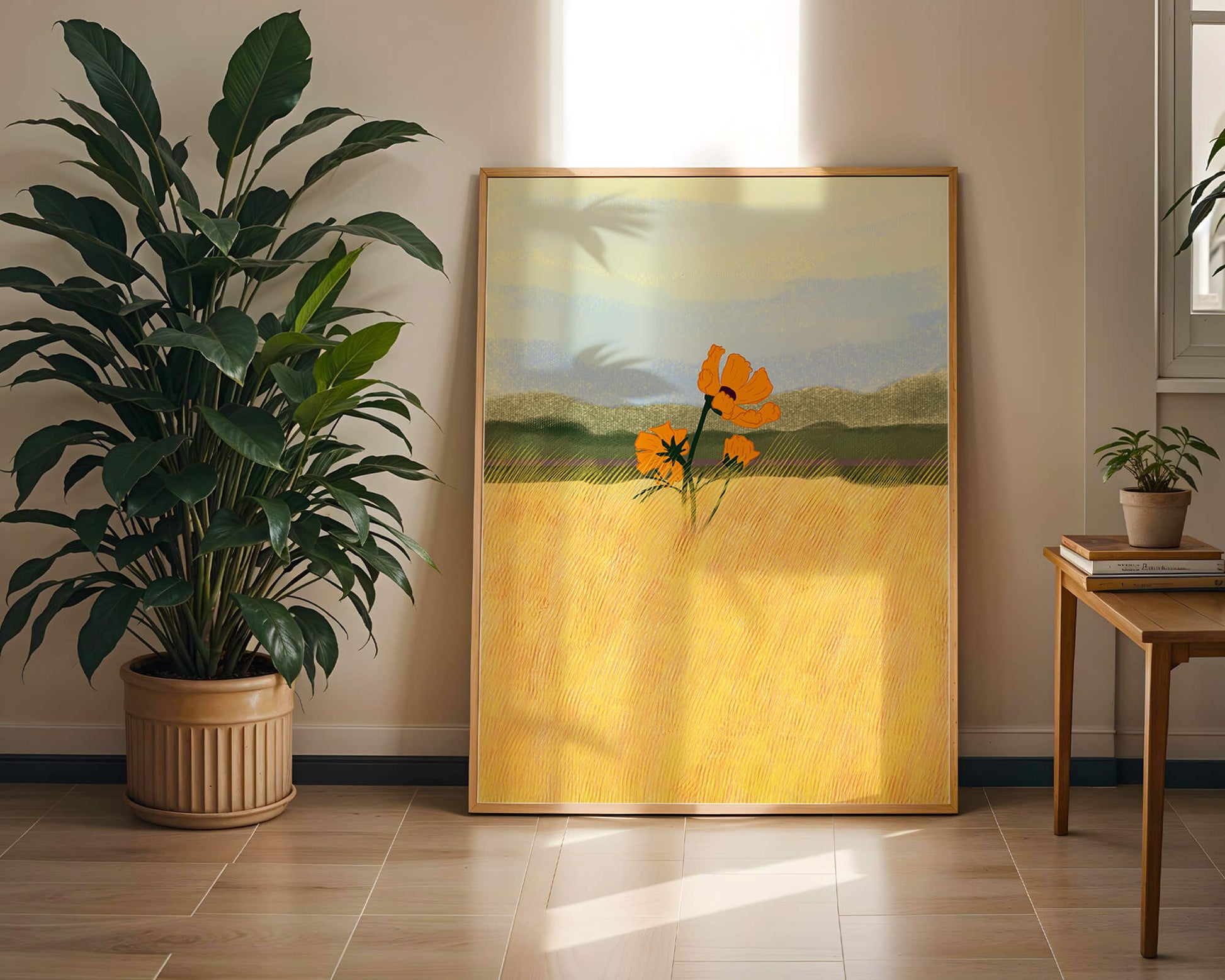 Orange Flowers in a Golden Field with Mountains and Blue Sky