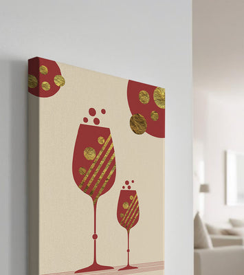 Stylish wine glasses with gold accents and a festive theme
