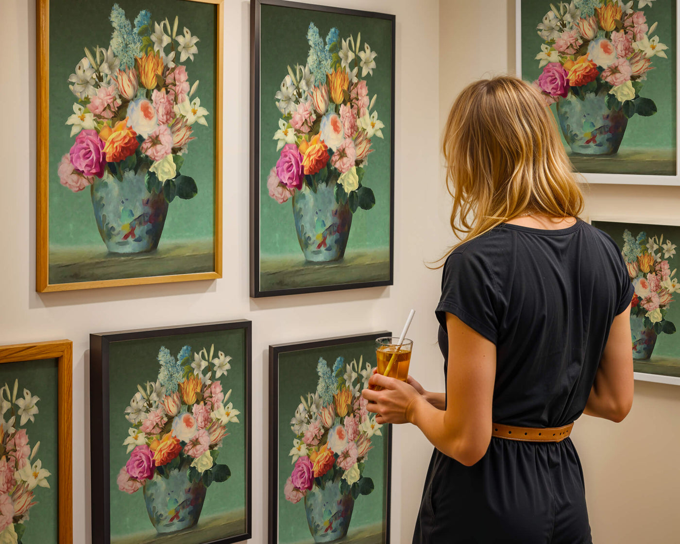 Floral arrangement in a decorative vase on a green background