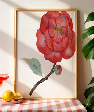 Watercolor illustration of a red camellia flower with green leaves