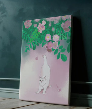 White cat stretching beneath blooming flowers in a pastel garden setting