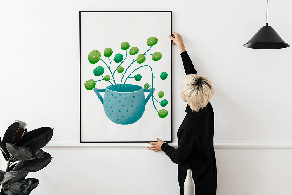 Ilustración minimalista de una planta pilea verde en una maceta de cerámica azul
