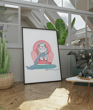 Cozy knitting cat relaxing in an armchair with a warm scarf - Mi tienda