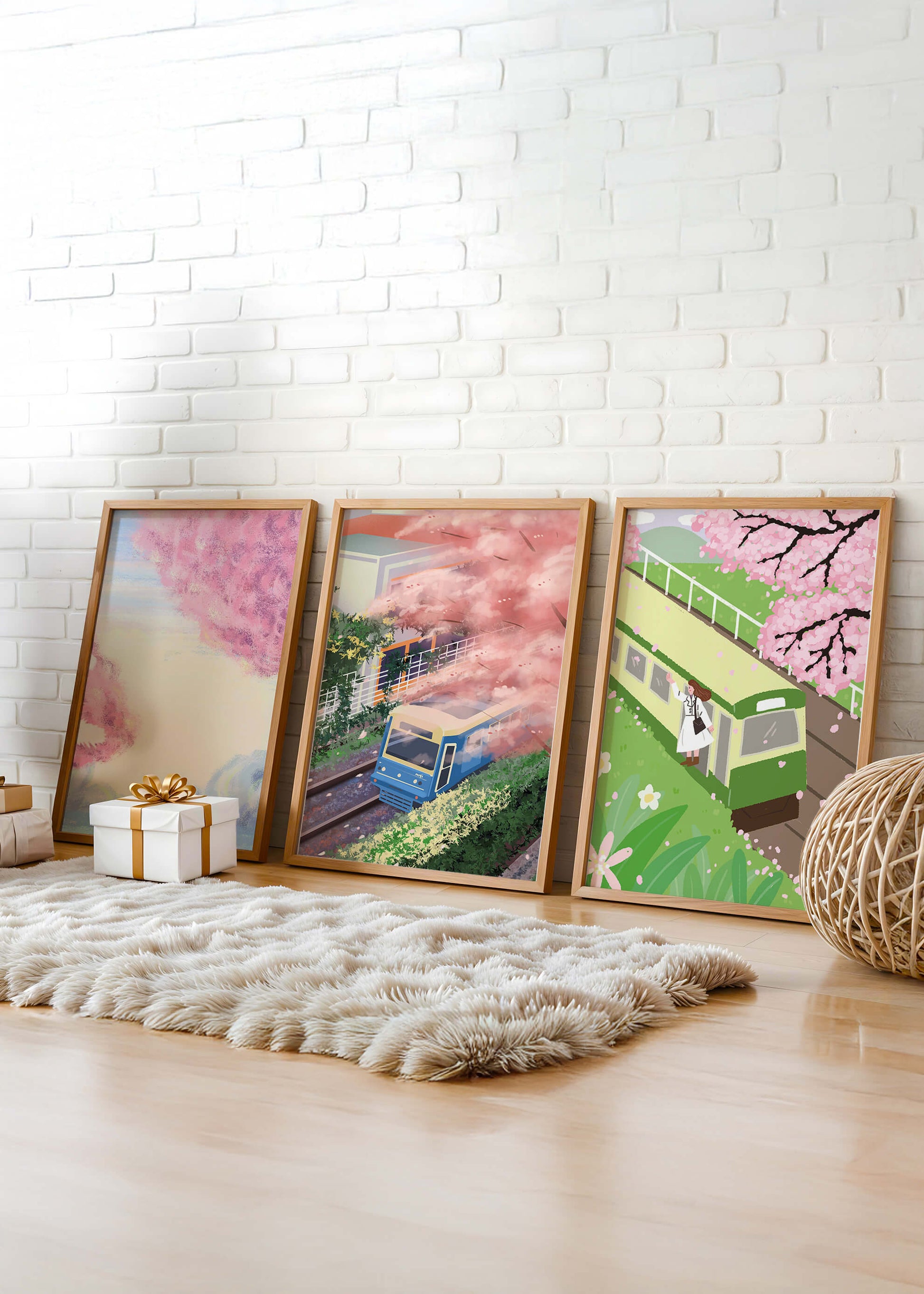 Ensemble de trois tableaux avec des paysages de cerisiers et des trains