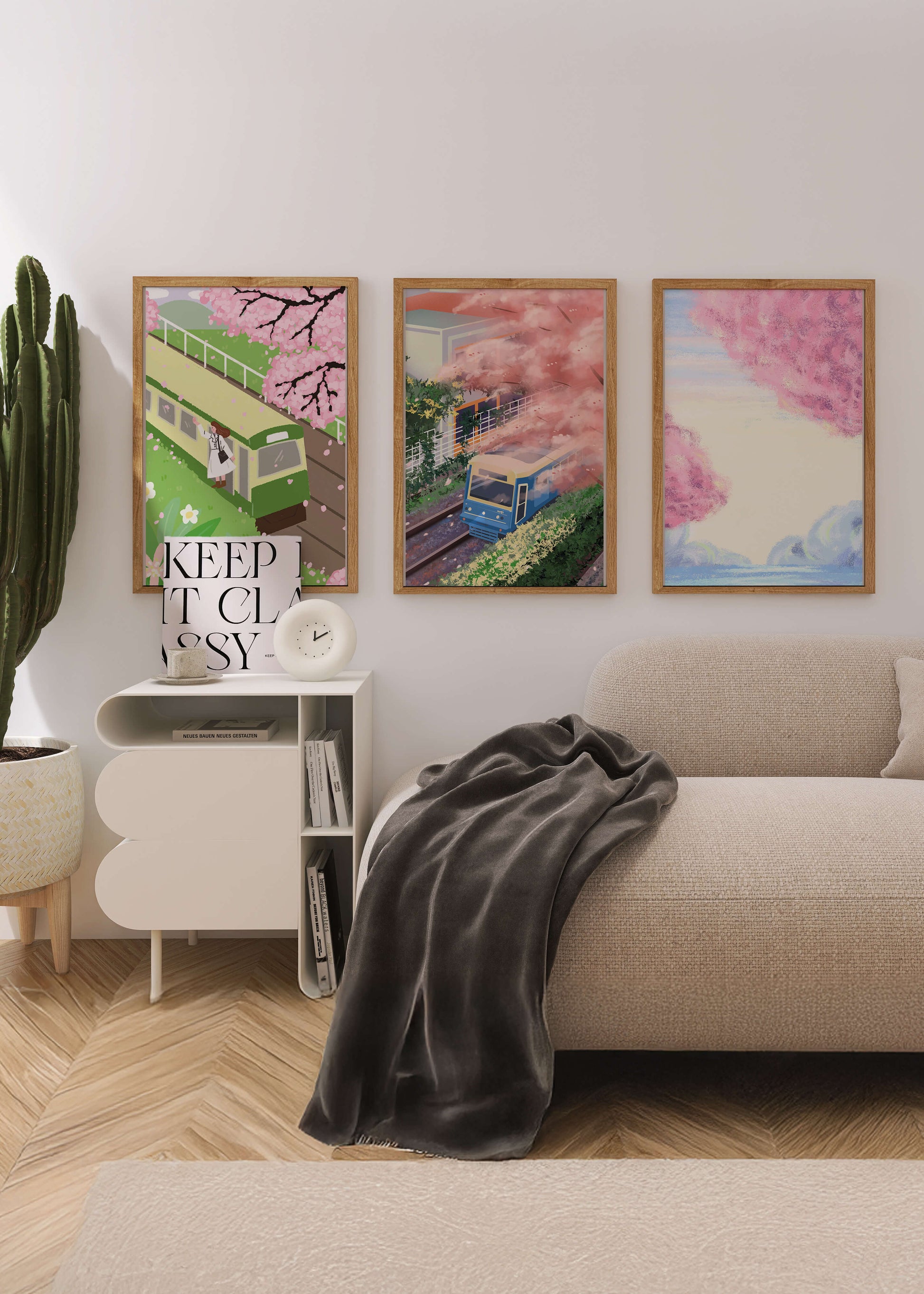 Ensemble de trois tableaux avec des paysages de cerisiers et des trains